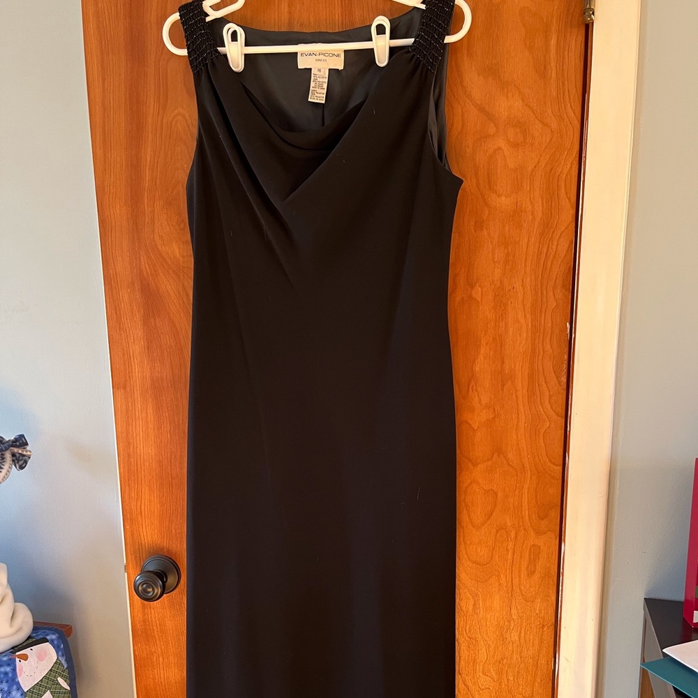 Little black dress. Mid length. No zippers, just slips on. Evan Picone.
